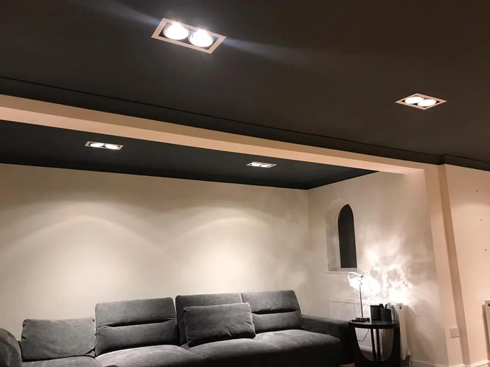 Spotlights and concealed lighting in a living room
